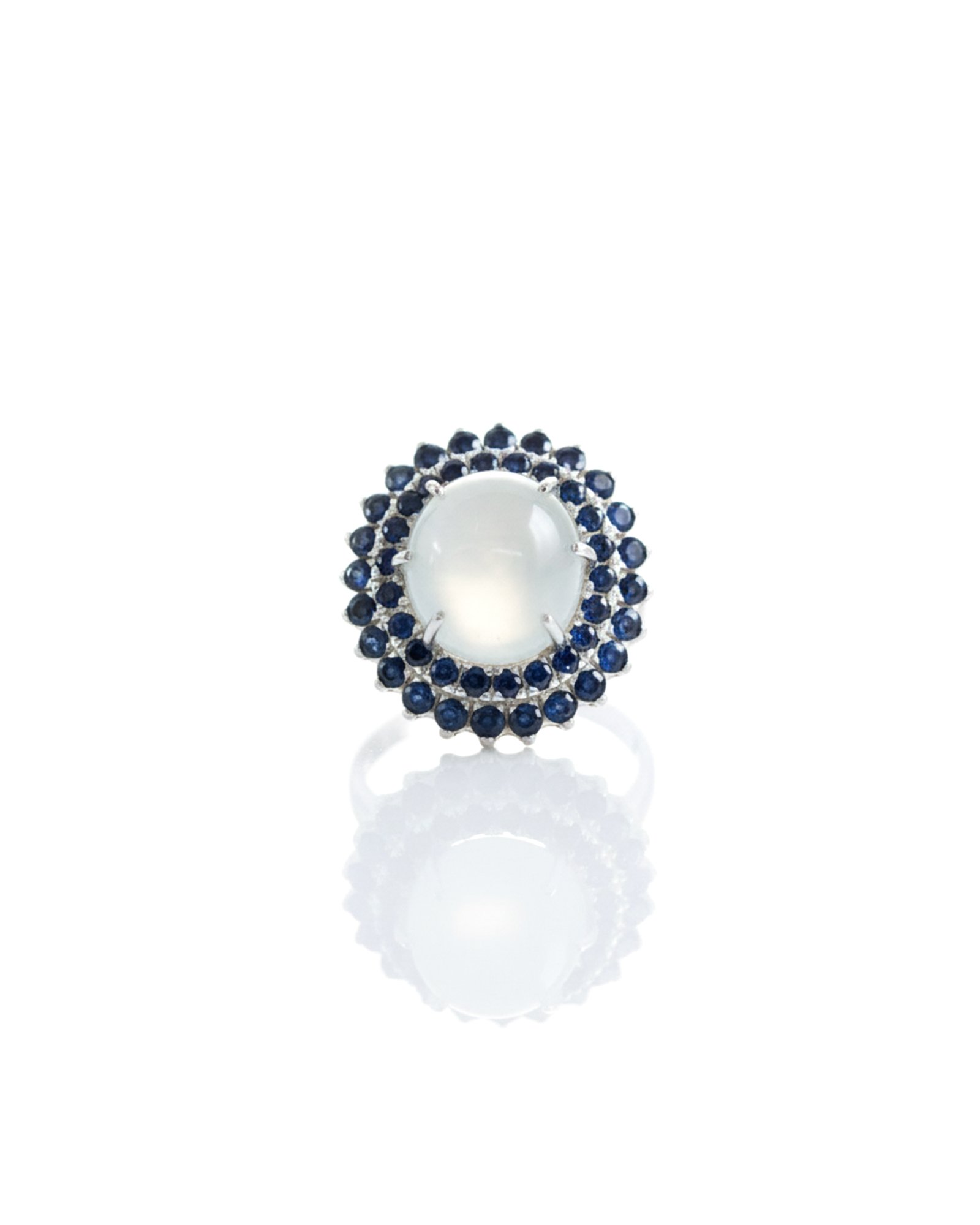 Front view of Sri Lankan Moonstone and Blue Sapphire Silver Cocktail Ring showcasing elegant moonstone center with natural blue sapphire accents, handmade in Sri Lanka.