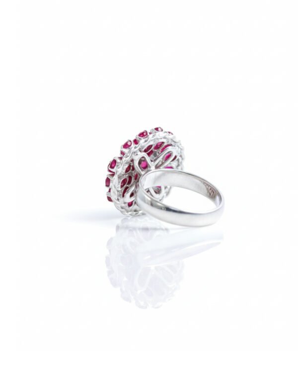 Side view of Silver Cocktail Rose Flower Design Ruby Ring highlighting detailed silver petals and gemstone setting crafted in Sri Lanka.