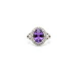 Front view of silver halo ring with Amethyst gemstone and American Diamonds