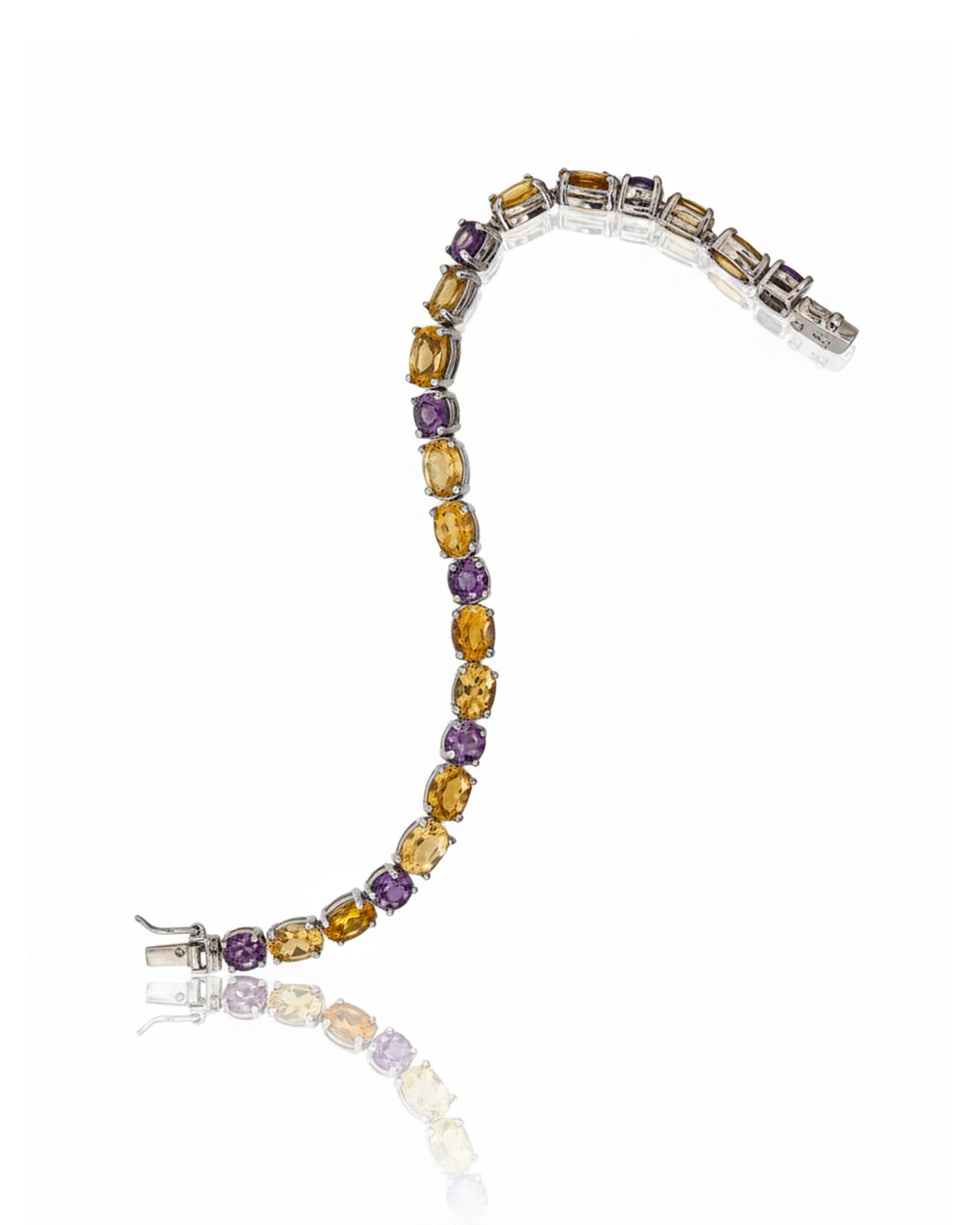 Front view of silver tennis bracelet with Amethyst and Citrine gemstones