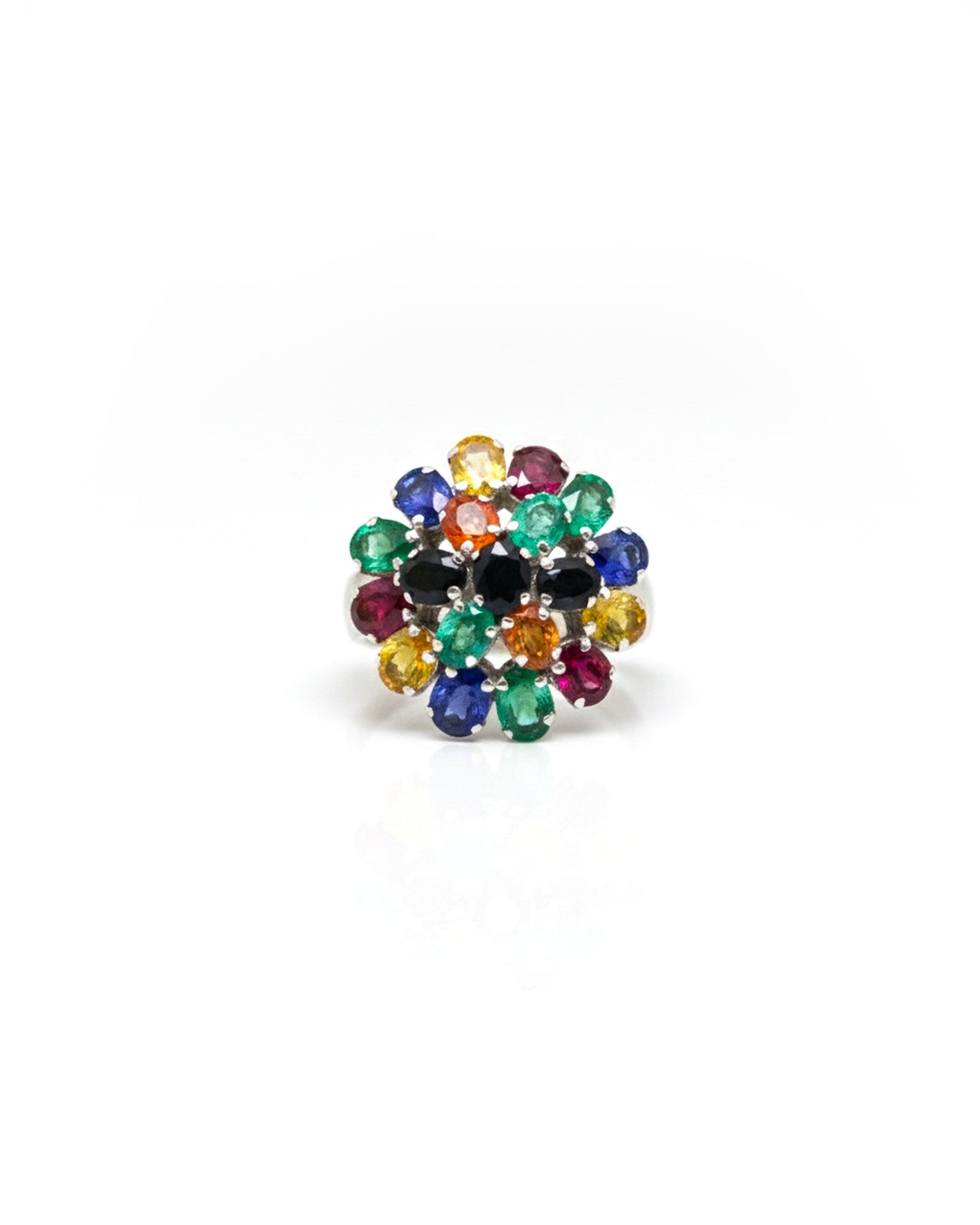 Front view of silver flower cluster ring with multicolor sapphire gemstones