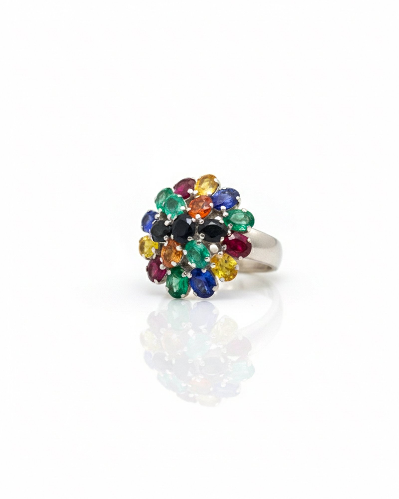 Side view of silver flower cluster ring with multicolor sapphire gemstones
