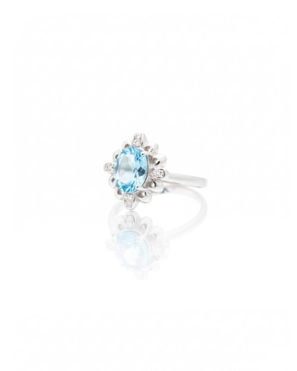 925 Silver Floral Halo Blue Topaz Ring L66641 – Side View Highlighting Flower-Shaped Halo and Sterling Silver Carved Setting