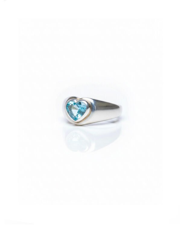Side view of 925 silver Blue Topaz Heart Dome Ring highlighting chunky dome band and heart-shaped gemstone – L66646