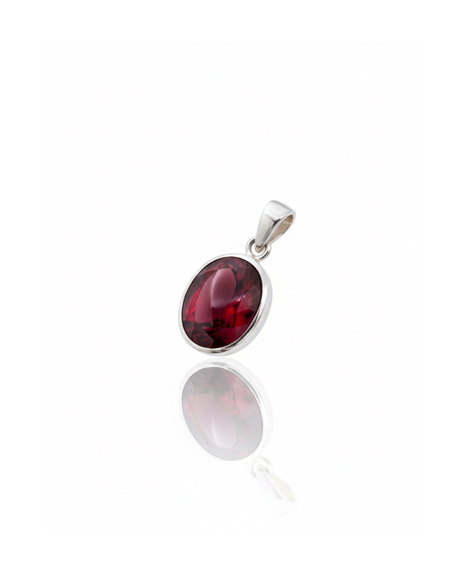 Front view of 925 silver garnet pendant necklace with oval red garnet in bezel setting – L66647