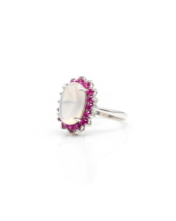 Side view of 925 sterling silver blue moonstone and ruby cluster ring showing vintage Victorian setting and band details