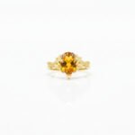 925 yellow gold-plated sterling silver ring with pear-shaped citrine center and white topaz halo, vintage filigree design